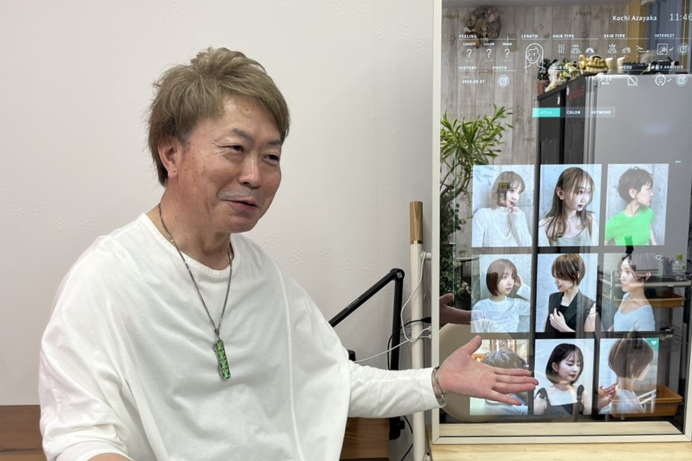 ECILAのインタビューを受ける田口 高徳さん(オーナー)